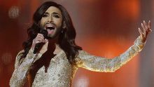 AP10ThingsToSee - Singer Conchita Wurst, representing Austria, performs the song "Rise Like a Phoenix" during a ...