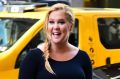 Amy Schumer is seen walking in Midtown on August 23, 2016 in New York City.