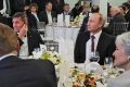Michael Flynn (centre left) is seated next to Russian President Vladimir Putin at an event celebrating RT, the  ...