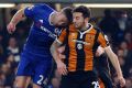 Hull City's Ryan Mason collides with Chelsea's Gary Cahill.