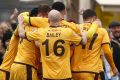 Sutton's players celebrate a goal during the FA Cup against Leeds United.