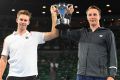 John Peers and Henri Kontinen pose with the trophy.