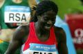 England's Natasha Danvers pretends to worship teammate Christine Ohuruogu after the 2006 Commonwealth Games relay.