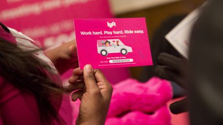 Lyft topped app store charts in the US after Uber's response to protests sparked anger.