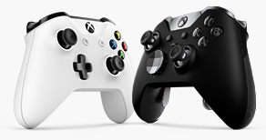 Angled view of a black Xbox One controller facing a white Xbox One controller