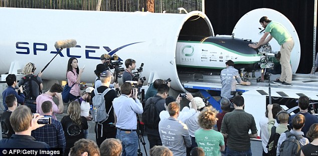 The Delft Hyperloop vehicle team from the Netherlands load up their pod during the SpaceX Hyperloop competition in Hawthorne, California on January 29, 2017.
Students from 30 colleges and universities from the US and around the world are taking part in testing their pods on a 1.25 kilometer-long Hyperloop track at the SpaceX headquarters.