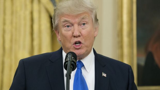 Donald Trump speaks in the Oval Office of the White House on February 1.