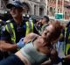 Five people were arrested as police moved to remove the homeless people from Flinders Street on Wednesday. 