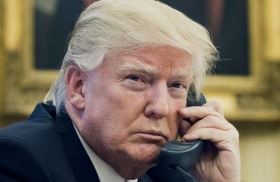 US President Donald Trump speaks on the phone with Australian Prime Minister Malcolm Turnbull. 