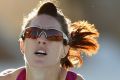 Canberra hurdler Lauren Wells has run her season best time just weeks before the world championships in Beijing.
