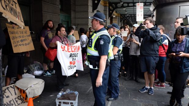 Police moving on the homeless on Wednesday.