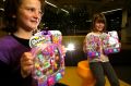 Bridget Lavelle and Sidney Silkstone are seen playing with Shopkins.
