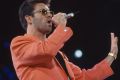 George Michael performing on stage during the Freddie Mercury Tribute Concert for Aids Awareness at Wembley Stadium in ...