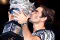 Roger Federer with the Australian Open trophy. Again.