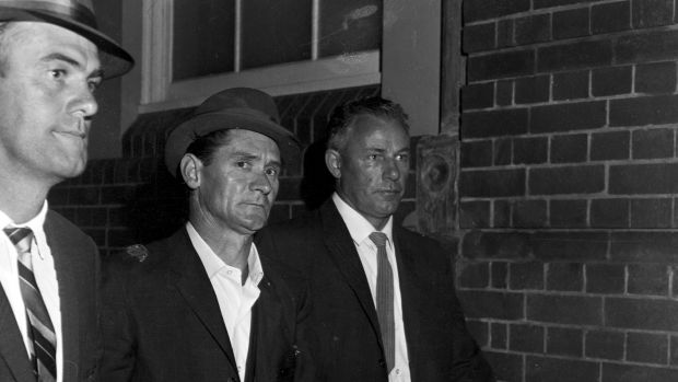 Melbourne prison escapee Ronald Ryan is taken to police headquarters in Sydney after his recapture, 5 January 1966.