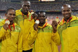 FILE - In this Saturday, Aug. 23, 2008 file photo, Jamaica's men's 4x100 meters relay team, from left, Michael Fraser, ...