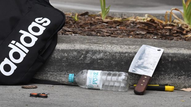 A meat cleaver could be seen in the gutter in the car park where the boy was arrested.