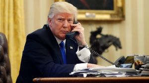 President Donald Trump speaks on the phone with Prime Minister of Australia Malcolm Turnbull in the Oval Office of the ...