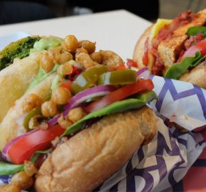 New School Canteen's vegan burgers. Pacha Mama (left) with chilli and spring onion potato cake and chickpea salsa, and ...