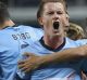 SYDNEY, AUSTRALIA - NOVEMBER 05:  Brandon O'Neill of Sydney FC celebrates a goal scored by David Carney of Sydney FC ...