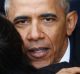 Former President Barack Obama hugs supporters as he prepares to depart Andrews Air Force base.