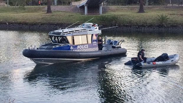 Police search the Maribyrnong River.