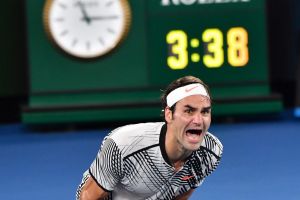 Roger Federer celebrates after beating Rafael Nadal.