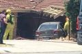 The unmarked police car crashed into the front of the Dianella house. 