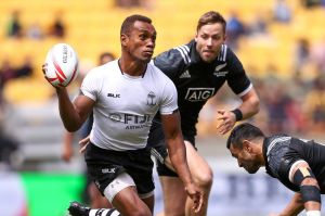 Osea Kolinisau (left) in action against New Zealand in Wellington.