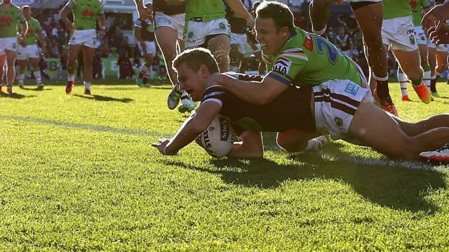 SYDNEY, AUSTRALIA - AUGUST 27: Tom Trbojevic of the Sea Eagles scores a try during the round 25 NRL match between the ...