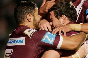 SYDNEY, AUSTRALIA - JULY 04: Nathan Green of the Sea Eagles celebrates scoring a try with team mates during the round 17 ...