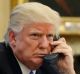 President Donald Trump speaks on the phone with Prime Minister of Australia Malcolm Turnbull in the Oval Office of the ...