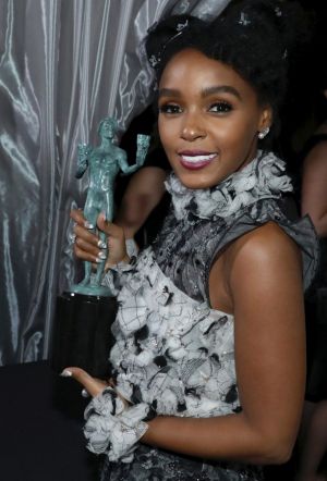 Janelle Monae backstage with her SAG award for outstanding performance by a cast in a motion picture for <i>Hidden ...