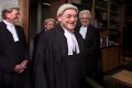 Justice Adrian Smithers and fellow judges in his chambers following his retirement ceremony in 2002.