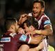 SYDNEY, AUSTRALIA - JULY 04: Nathan Green of the Sea Eagles celebrates scoring a try with team mates during the round 17 ...