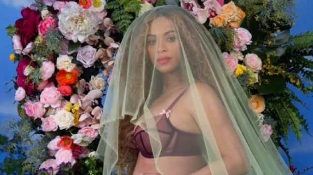 Beyonce shows off her baby bump in an Instagram post announcing her pregnancy.