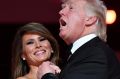 U.S. President Donald Trump sings along with the music as he dances with First Lady Melania Trump during the Liberty ...