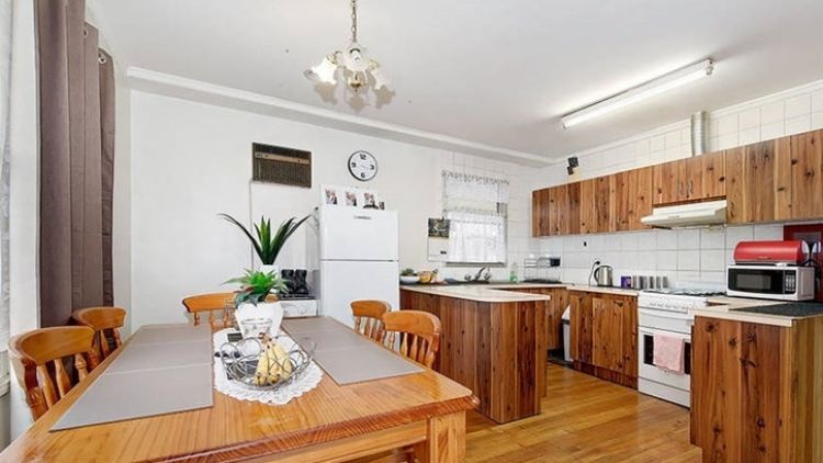 The interiors of Melbourne's cheapest house were in need of some renovation, but mostly liveable.