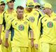 MELBOURNE, AUSTRALIA - JANUARY 15: Steven Smith and David Warner of Australia lead Australia from the field after losing ...
