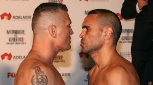 Face off: Danny Green and Anthony Mundine at the weigh-in on Thursday.