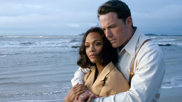 Ben Affleck with Zoe Saldana in <i>Live by Night</i>.