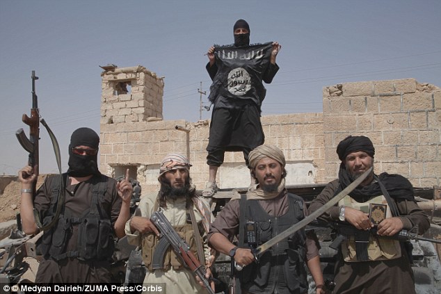 ISIS to set up camp in Europe? Militants for the Sunni group pose for a photo on the Iraq-Syria border (FILE PHOTO) 