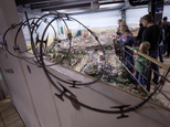 In this Jan. 31, 2017 photo visitors to the miniature wonderland in Hamburg , Germany, can only look at a model landscape of the United States from behind a wall .  (Christian Charisius/dpa via AP)