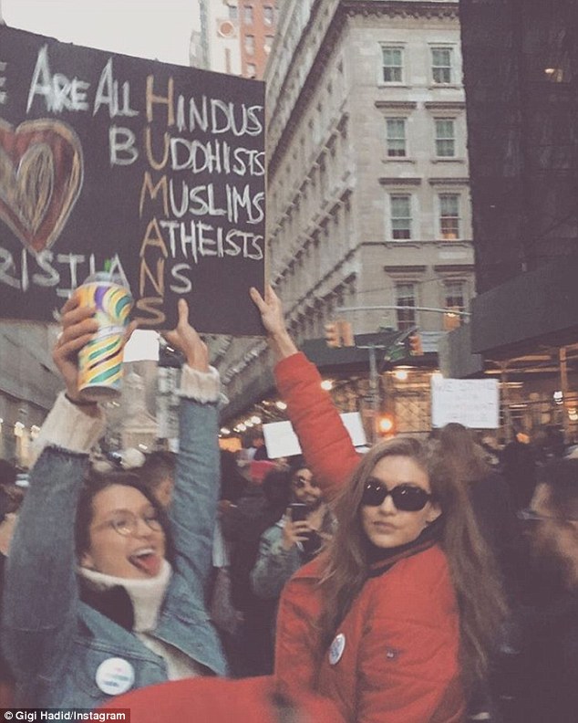 Standing up for a cause: On Sunday, Gigi and her younger sister Bella, 20, joined a protest against President Trump's immigration ban