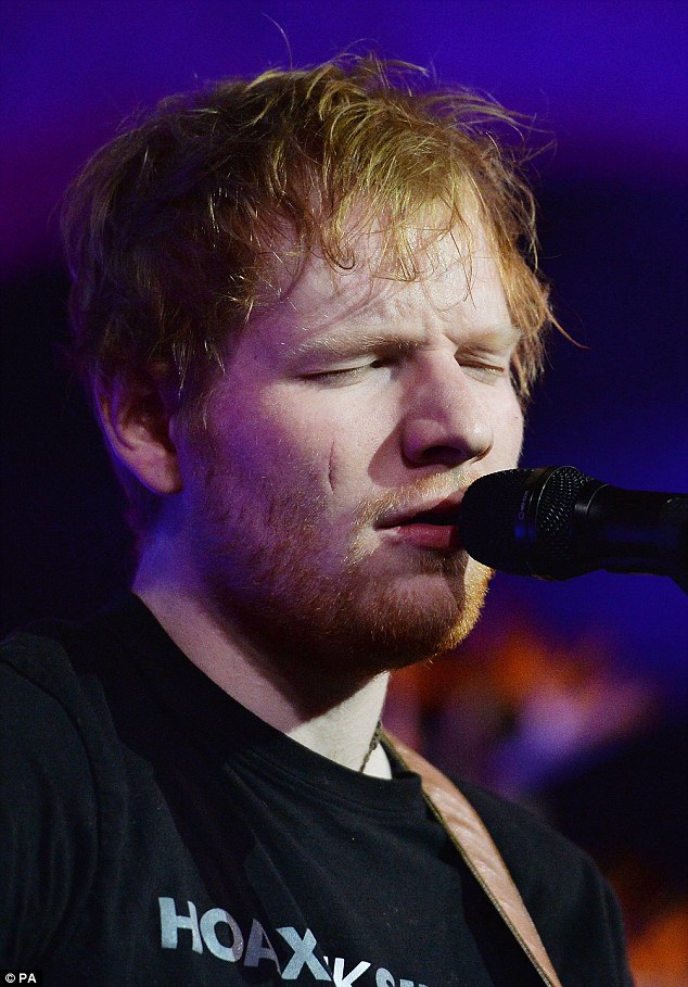 Ouch! Ed Sheeran didn't realise his face had been cut open during his infamous sword incident with Princess Beatrice until seeing his shirt was 'covered in blood'