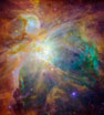 This Nasa image captured on April 12, shows baby stars creating chaos 1,500 light-years away in the cosmic cloud of the Orion Nebula. Four massive stars make up the bright yellow area in the center of this false-color image for the Spitzer Space Telescope.