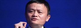 Jack Ma, billionaire and chairman of Alibaba Group Holding Ltd., gestures as he speaks during a panel session at the ...