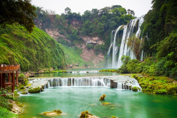 HUANGGUOSHU WATERFALLS. Asia's largest waterfalls – a series of nine cascades over two kilometres in the southern ...