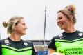 Canberra United players Ellie Brush and Jenna McCormick outside Canberra Stadium. Both women have had to put their AFL ...