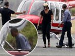 The Obamas arrived at the airport in Tortola on a red helicopter